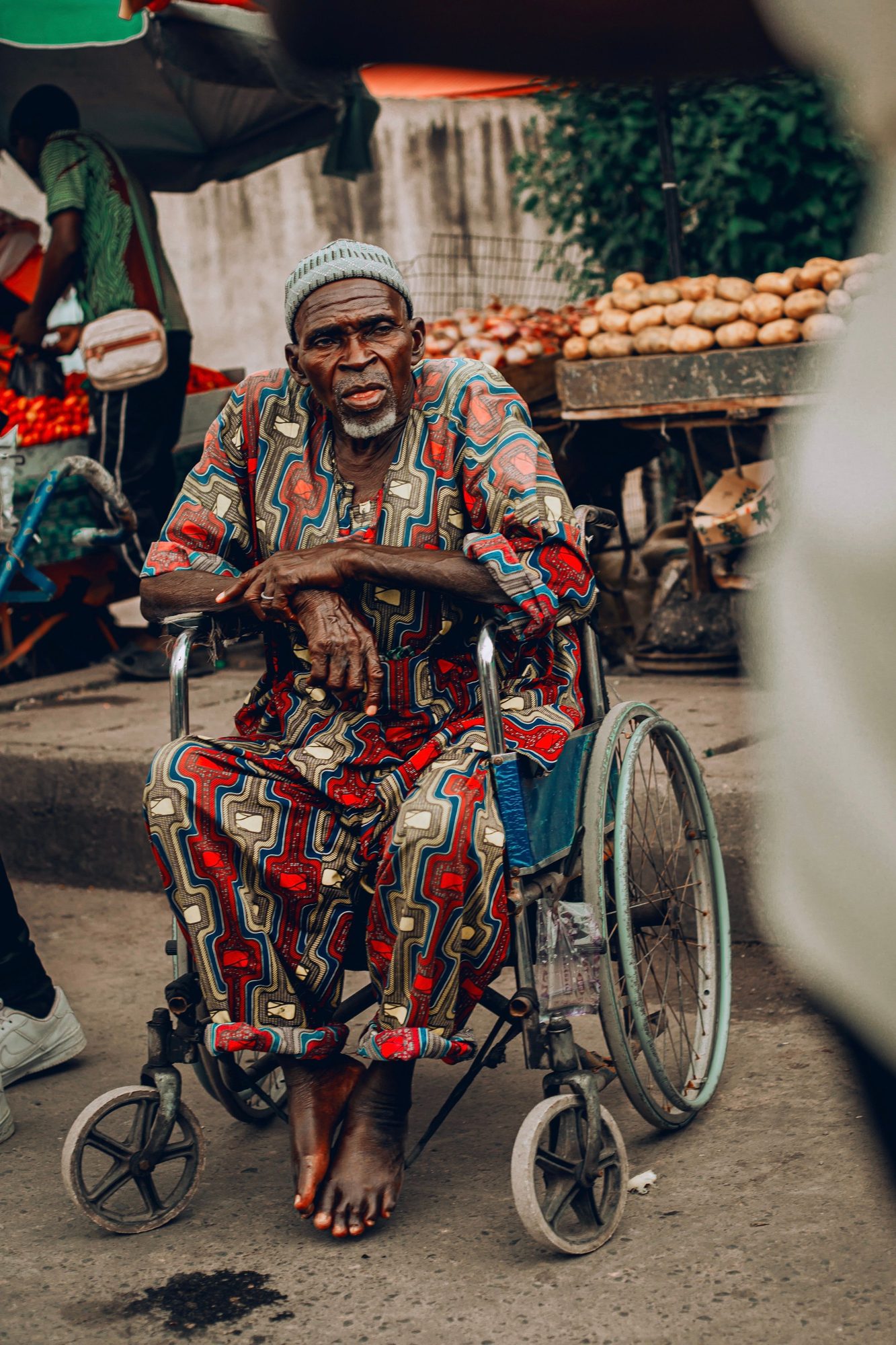 An elderly man in his community, representing those our programs support